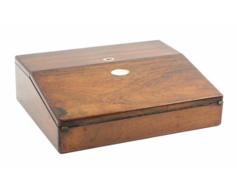 Two boxes, comprising a rosewood writing slope, velvet slope below various lidded compartments and a brass top inkwell, 30.5c