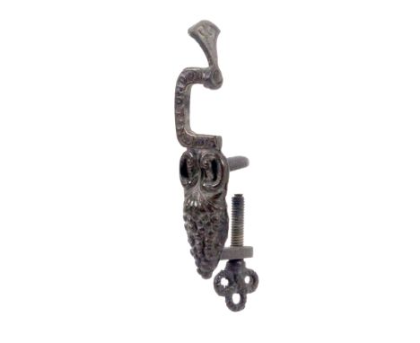 An unusual cast iron sewing clamp, with swing grip the frame cast 'Worth London' over a bunch of grapes, 12cms.