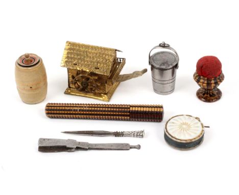 A mixed lot, sewing, comprising a gilt brass novelty tape measure in the form of a Swiss chalet with water wheel, tape commen