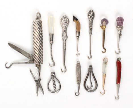 A collection of eleven miniature glove button hooks and a corkscrew, seven with fixed hooks all with decorative handles inclu