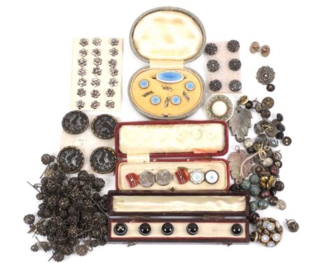 Buttons, a comprehensive set of silver filigree ball buttons with T bars, in two sizes, an oval cased set of silver enamel br
