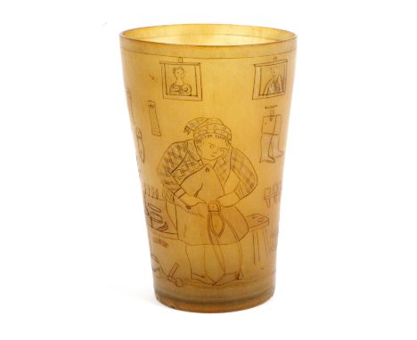 An early 19th Century scratch engraved horn beaker depicting the cottage trade of shoe making, a male figure at his bench wit