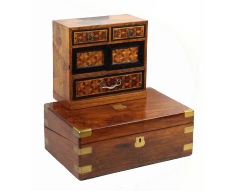 A brass bound walnut writing box and a Japanese table cabinet, the rectangular writing box with replacement gilt tooled writi
