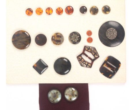 Buttons, tortoiseshell etc., and two nature buttons, comprising a card of nineteen including two buckles and centred by a fin