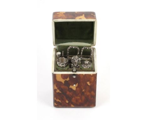 A fine example of an English tortoiseshell Lady's Companion, circa 1840, of rounded corner rectangular section, the slightly 