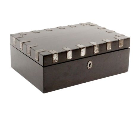 An English ebony sewing box, circa 1835, of rectangular form, the lid with steel strap mounts, the interior in red silk, the 