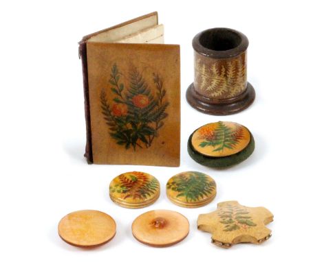 Fern ware, seven pieces, comprising a scarce pair of translucent Fern ware buttons, 3.4cms dia., a disc form pin cushion, 3.5