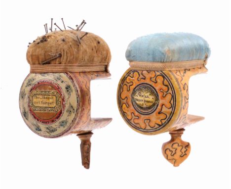 Two white wood paint and label decorated Tunbridge ware sewing clamps, both with sponge work painted cylinder frames below pi