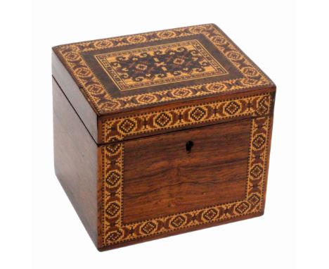 A Tunbridge ware rosewood tea caddy, of rectangular form, the front with a border of geometric mosaic, the lid with a panel o