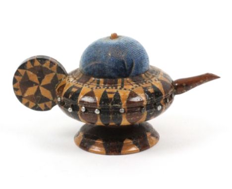 A Tunbridge ware teapot pin cushion by Thomas Barton, in stick ware, blue velvet cushion, the body incorporating a pin wheel,