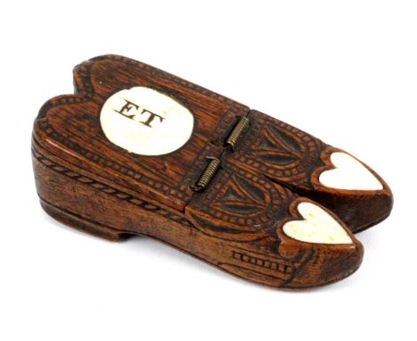 An early 19th Century chip carved and bone mounted double shoe snuff box, probably French prisoner of war work, the toes inse