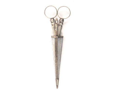A late 18th Century silver and mother of pearl scissor etui, the hexagonal tapering sheath with leaf engraved mother of pearl