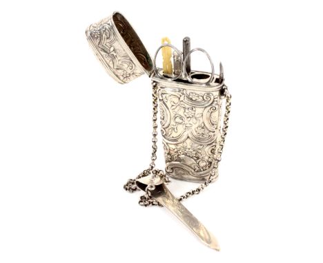 A late 18th Century silver travelling etui, on twin chains to a plain silver chatelaine hook with English Georgian duty mark 