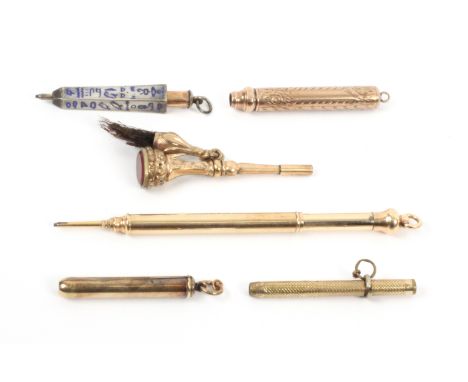 Writing implements, comprising six 19th Century mostly push pull format comprising a gold coloured example stamped 'W.S. Hick