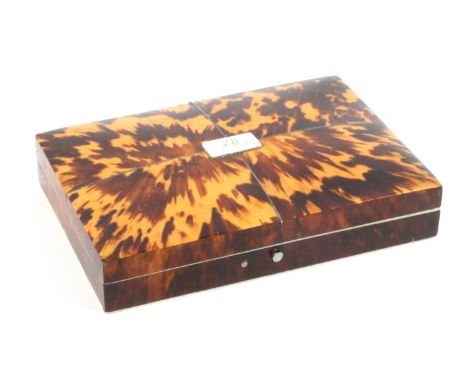 A tortoiseshell small format sewing box, circa 1840, the silver tools attributed to Joseph Taylor, of rectangular form, the c