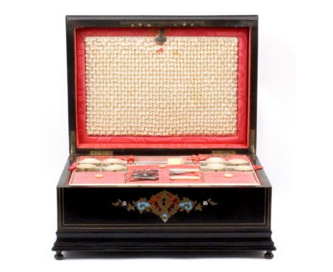 A well fitted French ebonised inlaid sewing box, circa 1850, of rectangular form, the lid and front inlaid with cut and engra