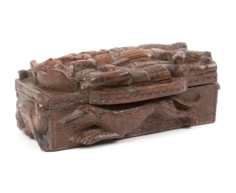 A Scottish 'blind man' deep carved oak snuff box, wooden hinge, the lid with two men in kilts one playing bagpipes the other 