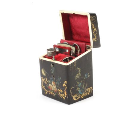 A good example of an English papier mache Lady's Companion, circa 1850, of rectangular section, the sides painted with flower