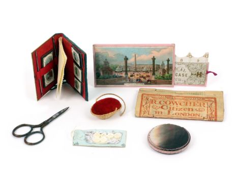 A mixed lot, sewing, comprising a coloured printed cardboard synoptical needle case with view titled 'Place De La Concorde', 