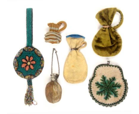 Six various purses, comprising a near circular bead work example with steel clasp, 11cms, another circular bead work example 