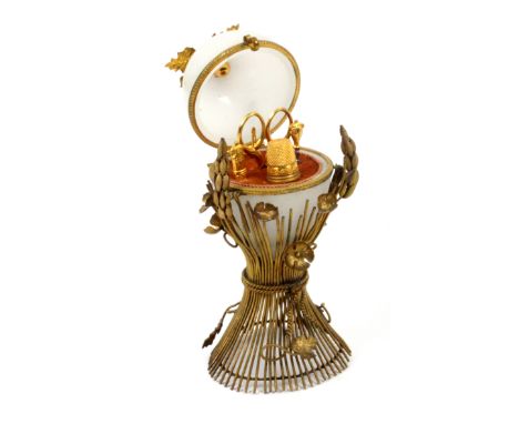 A French gilt metal and glass etui for a child, circa 1880, in the form of a gilt metal corn stook adorned with flowers, supp