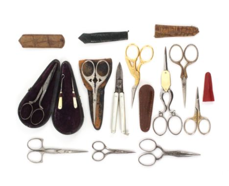 Scissors and sheaths, comprising a leather cased pair of steel scissors with miniature bone handled stiletto and button hook,