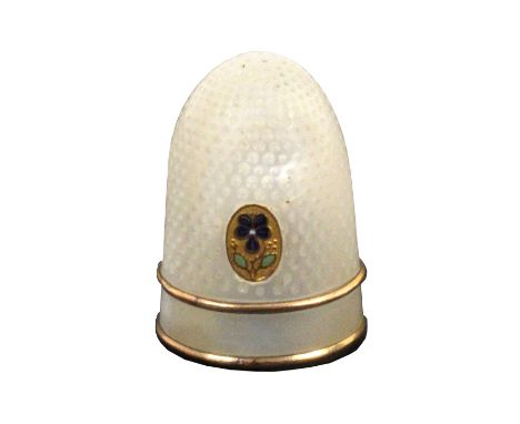 A good Palais Royal mother of pearl thimble, the body with gilt metal and enamel oval pansy motif over a plain frieze within 