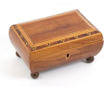 A small rosewood and inlaid Tunbridge ware sewing box, of bombe form raised on ball feet and with pointed oval box wood escut