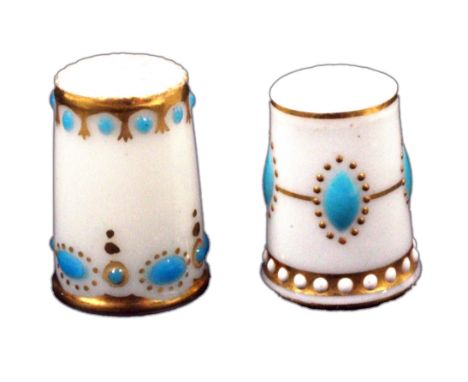 Two Royal Worcester jewelled porcelain thimbles, unmarked. &nbsp; &nbsp; (2) &nbsp; &nbsp; &nbsp; &nbsp; &nbsp; &nbsp; &nbsp;