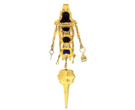 A late 18th Century gilt metal and blue glass mounted chatelaine, the bell shaped gilt scroll hook mount incorporating a coba