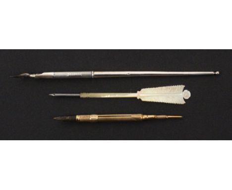 Writing implements, comprising a silver dip pen stamped within a rectangle 'S. Mordan and Co., Sterling Silver', 17.5cms excl