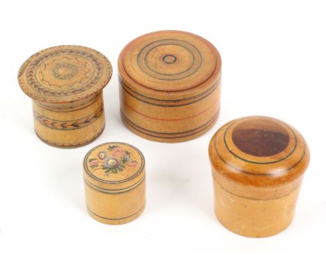 Four white wood Tunbridge ware boxes, comprising a circular puzzle box with ring painted decoration, 6.5cms dia., another the