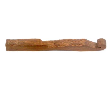 A carved oak knitting stick, late 19th Century, scroll end, carved and initialled 'FB', 17cms.