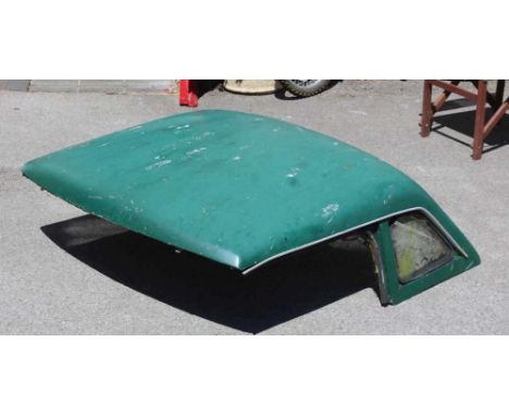 A VINTAGE GREEN FINISHED MG HARD TOP COVER 