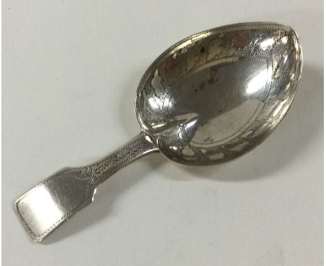 A good Georgian silver caddy spoon with bright cut decoration. Birmingham. Approx. 8 grams. Est. £70 - £80.