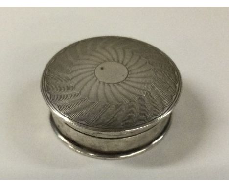 An engine turned silver box. Birmingham 1936. By WG Sothers Ltd. Approx. 11 grams. Est. £30 - £40.