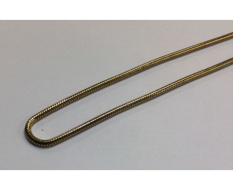 A 9 carat snake link necklace with ring clasp. Approx. 19 grams. Est. £280 - £320.