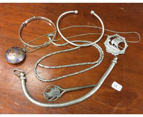 A silver torque bangle, brooches etc. Est. £20 - £30.