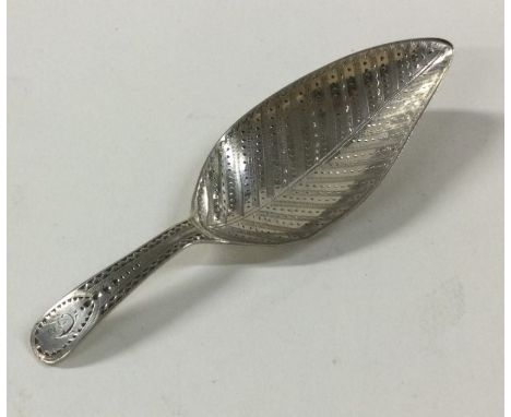 A good bright cut silver caddy spoon. London. Approx. 11 grams. Est. £70 - £80.