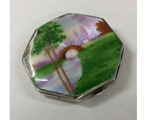 A silver and enamel compact. Birmingham 1932. By BH&amp;M. Approx. 60 grams. Est. £50 - £80.