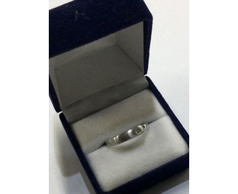 A small 9 carat diamond single stone ring. Approx. 2 grams. Est. £30 - £50.