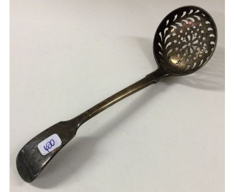 A silver fiddle pattern sifter ladle. London. By WC. Approx. 49 grams. Est. £20 - £30.