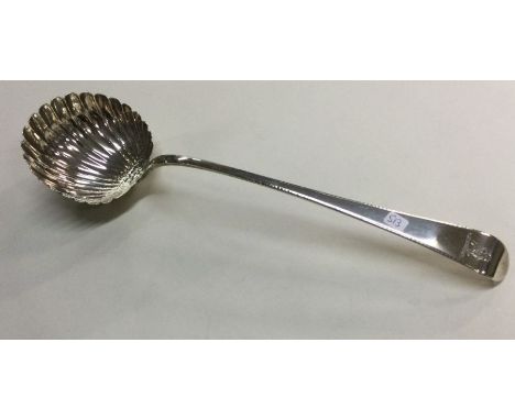 A heavy silver soup ladle with fluted bowl to crested terminal. London 1776. By William Sumner & Richard Crossley. Approx. 16