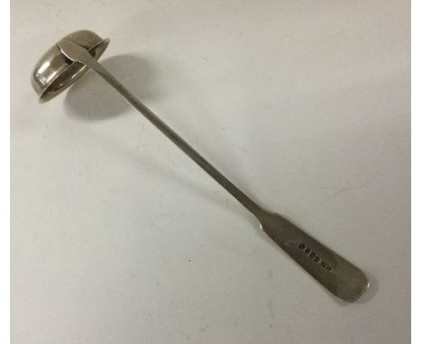 An unusual Georgian silver toddy ladle. 1925. By Taylor and Perry. Approx. 15 grams. Est. £40 - £60.