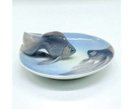 Marvelous small dish decorated with two fish, one is 3D, raised out of the dish from the tail. Royal Copenhagen backstamp. Di