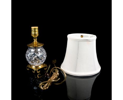 Cut crystal spherical design with brass mountings. Includes original signed Waterford lamp shade. Waterford etched backstamp.