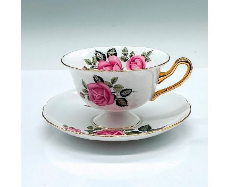 A set of white cup and saucer adorned with pink roses and gilded trims. Shelley backstamps. Cup: 4.75"L x 4"W x 2.5"H. Saucer