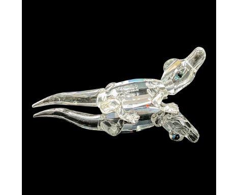 Originally part of the Endangered Species family group, this Swarovski crystal Alligator was made in clear faceted and molded