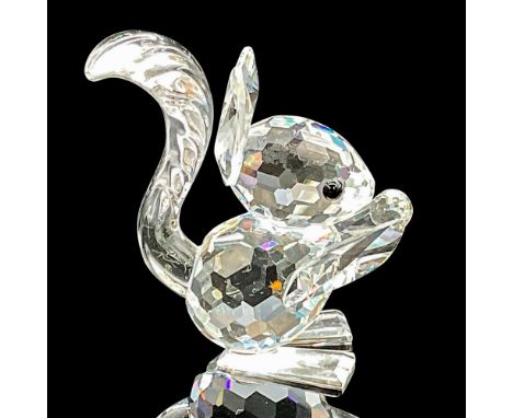 This Swarovski squirrel was part of the Rare Encounters group and features a clear faceted body with clear acorn plus tall ea