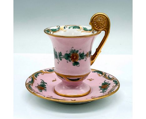 Hand painted beautiful matte finish pink cup and saucer adorned with gold-colored roses. Gilded handle with an embossed relie